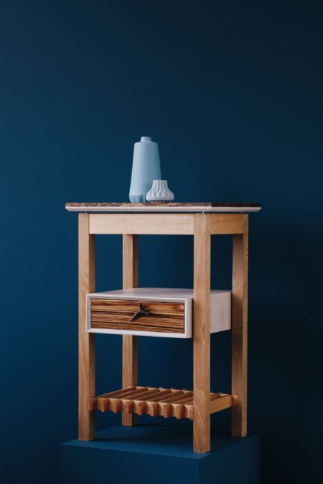 Bedside table with handcarved handle